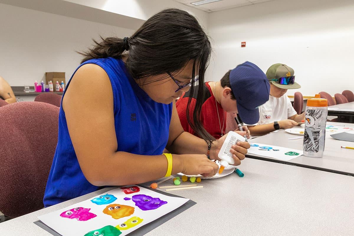 Kids Kollege students taking an arts class